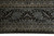 Border detail of silver grey cartouches, ivory rosettes and antique gold outlines on black ground