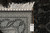 Reverse of the 6x9 silk rug with authenticity tag, ivory fringe and clear knot definition