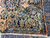 11'6" x 20'6" Sarouk rug corner folded over showing dense pile and ivory cotton fringe