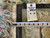 Reverse tag reading rug number 29977 with tape measure confirming the 9 x 12 size