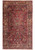 Full overhead view of 10'1" x 17'6" antique Persian Sarough rug with burgundy field and navy border