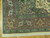 Corner detail of rust brown border, green spandrel and ivory fringe on large Persian rug