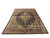 Angled full view of the oversize wool and silk Tabriz rug showing scale and ivory fringe
