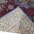Reverse side of the hand-knotted rug showing tight even knotting and clear pattern definition behind