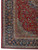 Corner detail showing navy floral main border, ivory guard stripes and pale spandrel drawing
