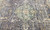 Wide detail of the medallion, deer figures and flowering vines on the gray blue field