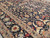 16x25 Soltanabad design rug photographed on the floor, showing wool pile sheen and border