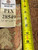 Back tag reading PIX 28549 beside a tape measure confirming the 12'10" x 15'7" size