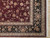 Corner detail of black palmette border, ivory guard bands and hand-tied ivory cotton fringe