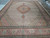 11'2" x 16' Persian Tabriz Mahi rug shown full length with salmon floral border and pendants
