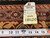Inventory tag reading genuine hand woven Oriental rug number PIX-18620 beside a tape measure