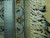 Ruler held against rug back and cotton fringe showing knot density and foundation of weave