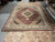 12 x 15 oversize Indian hand-knotted rug shown in showroom for room scale reference