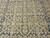 Close pile detail showing abrash in the vegetable dyed slate blue and warm beige lattice bars