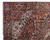 Corner detail showing ivory selvage, navy main border rosettes and angular cornerpiece of the Heriz