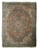 Full overhead view of rust Persian Heriz rug with navy medallion, ivory corners and fringe