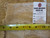 Back tag reading rug number 5949 with tape measure showing knot density and cotton foundation
