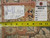 Reverse corner with inventory tags, rug number 5985 and tape measure confirming hand-knotted weave density