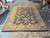 11'10" x 17'7" Indian Soltanabad rug laid flat in the Rugs.net Freeport warehouse showroom