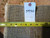 Back of the rug with tape measure, cotton foundation weave and inventory tag 5930