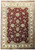 Burgundy Ziegler Chobi rug photographed flat, ivory floral border framing an all over palmette field