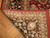 Folded corner showing cotton foundation and tight hand-knotted weave on the back of the rug