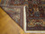 Corner folded back showing tight hand-knotted weave, cotton foundation and hand-tied ivory fringe