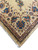 Border corner of new hand-knotted Indian rug with blue palmettes and rust vine scrolls