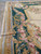 Green border length with pink rose swags, gold acanthus leaves and pale blue guard stripes