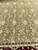 All-over floral field detail with lotus palmettes, rosettes and slender ivory vine scrollwork
