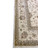 Close corner view of layered guard borders with olive vine scroll and rust flowering palmettes