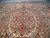 Diagonal view of the all-over floral field showing balanced mirrored Aubusson style drawing