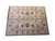 Oversize 12 x 15 Indian Oushak rug shown flat on white, ivory field with floral border