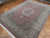 Angled floor view of the dusty rose field, sage green corners and ivory turtle border