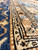 12x16 oversize Persian rug border detail with ivory guard stripes and brown floral vine work