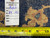 Back of the rug with dealer tag reading size 8.9 x 19.6 beside tape measure