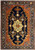 14'2" x 19'2" Persian Heriz rug shown flat with camel medallion on dark royal blue field