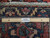 Ruler placed on the reverse confirming authentic hand woven construction and knot density of this Persian rug