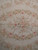 Macro of the rose wreath showing wheat, sage and rose wool in tapestry weave
