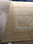 Corner detail showing pink rose spray, lattice guard band and plain wheat border edge