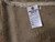 Back of rug with cotton fringe and tag reading Genuine Hand Woven Oriental Rug 5512