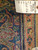 Back tag reading rug number 5591 size 10.10 x 18.6 on hand-woven wool