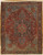 Full view of antique Heriz rug showing rust red field, navy star medallion and light blue spandrels