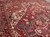 Close-up of ivory spandrel and blue palmette detail in this hand-knotted Persian village rug