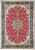 Deep red Persian Tabriz rug with navy floral border, ivory spandrels and green center medallion