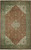 Rust field Persian Tabriz rug with ivory spandrels, camel border and central floral medallion