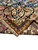 Folded corner revealing the back of the 13'1" x 19'5" Heriz rug weave
