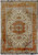 Full view of Persian Tabriz rug with cream field, peach medallion and coral floral border