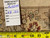 Back tag reading rug number 13344 with a tape measure confirming the 11.7 x 17.6 size