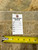 Back tag reading Genuine Hand Woven Oriental Rug, number 15442, size 13.6 x 15.10, with tape measure